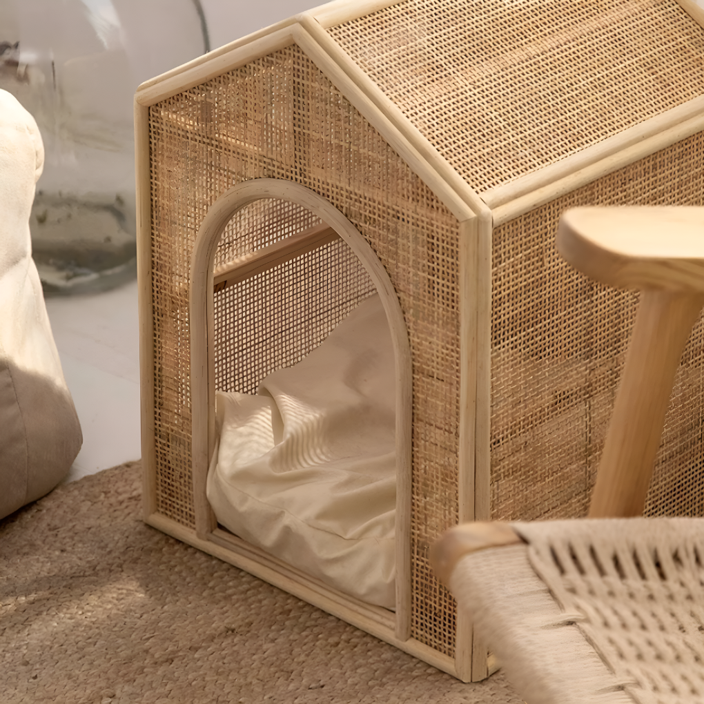 Elevated pet rattan bed in natural tan, offering comfortable rest for a small cat or dog, pet furniture