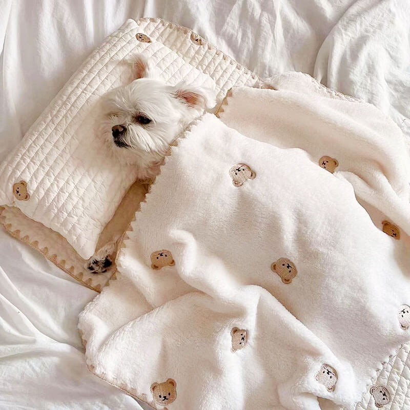 Washable cotton pet bed for small dogs or cats, features elegant embroidery, pillow, and quilt