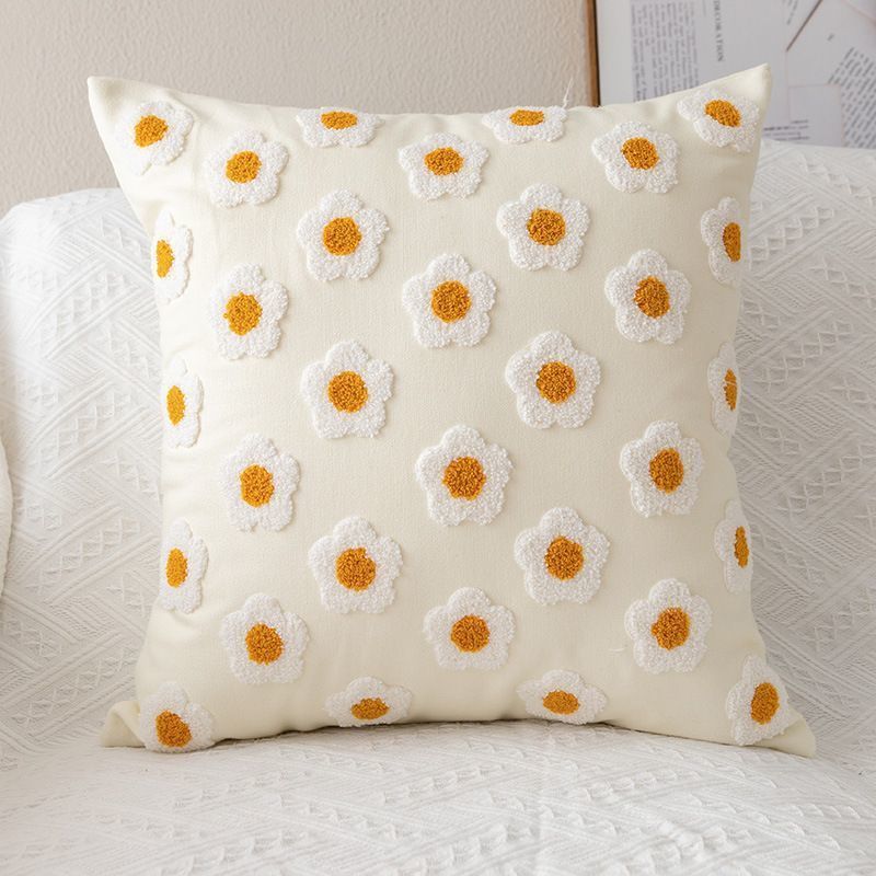 Flower throw pillow with delicate embroidery, a charming and comfortable home accent