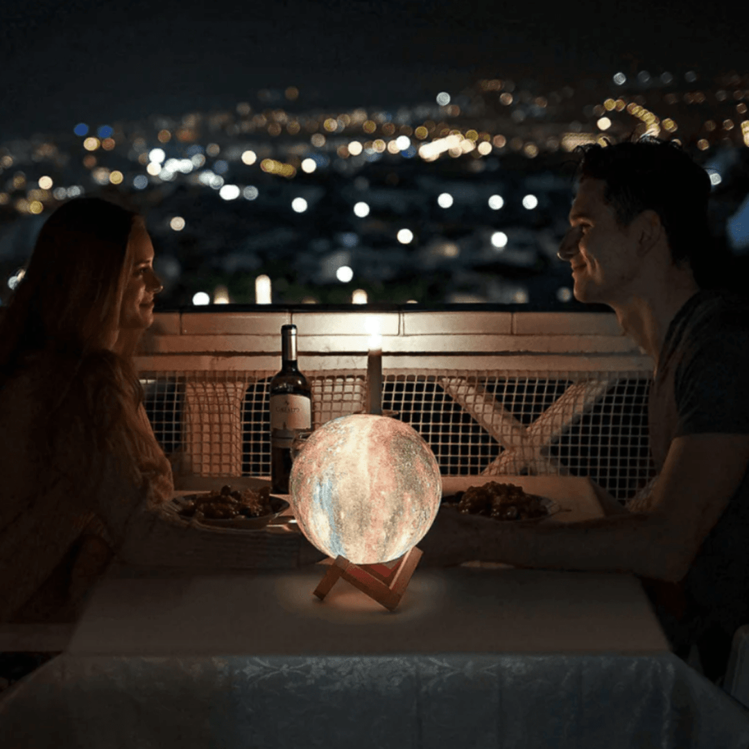 Ambient 3D moon lamp with 16 customizable LED colors, on an elegant wooden stand, perfect for creating mood.