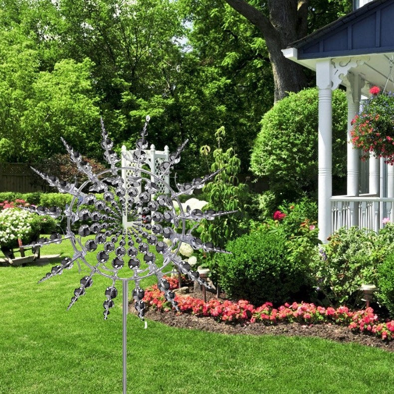 Durable anti-rust metal wind spinner, a kinetic windmill sculpture. Ideal weather-resistant garden decor & landscape accent.