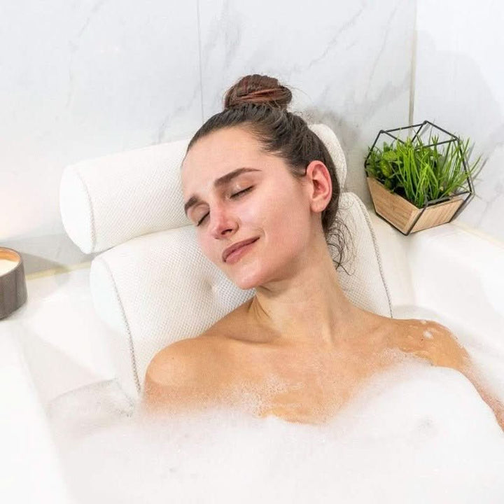 Spa comfort bath pillow for indulgent relaxation; provides ergonomic head and neck support for a luxurious soak.