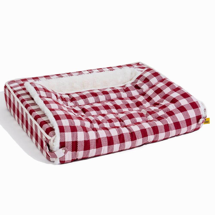 Gray plaid ergonomic dog bed, durable and washable, designed for ultimate pet comfort.