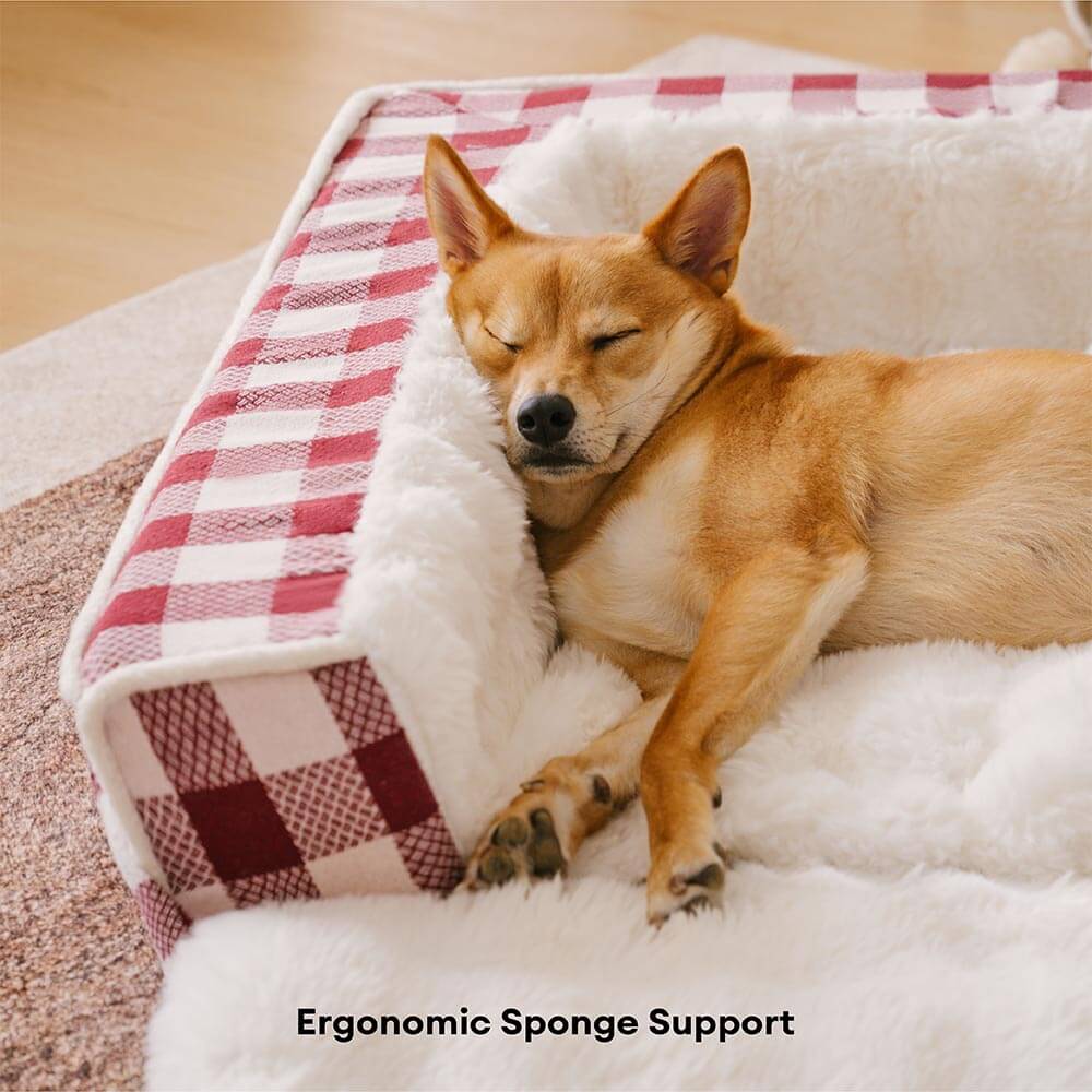 Plaid dog bed, ergonomic and calming, with an innovative expandable section for pets.