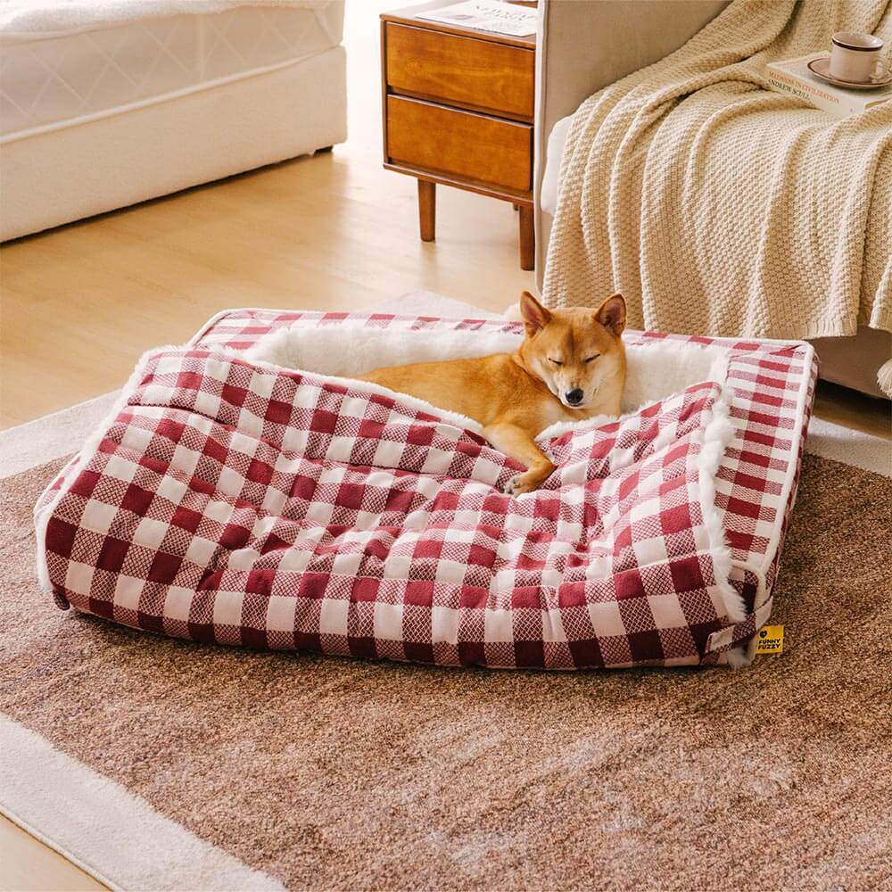 Calming pet bed, ergonomic support, gray plaid pattern detail, ideal for dog comfort.