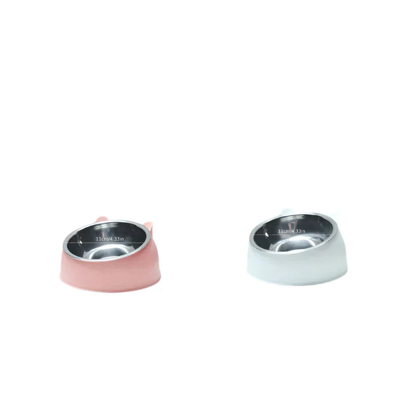 Ergonomic cat feeder, raised, minimizing strain on pet's neck.