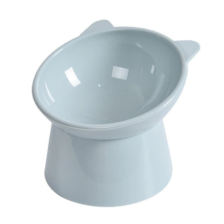 Compact ergonomic elevated pet feeder with slanted bowls, a durable and non-toxic solution for pets