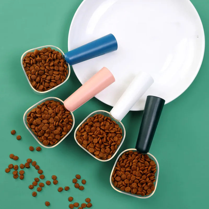 White ergonomic measuring spoon with comfort grip, ideal for dry food, rice, and pet food portion control.