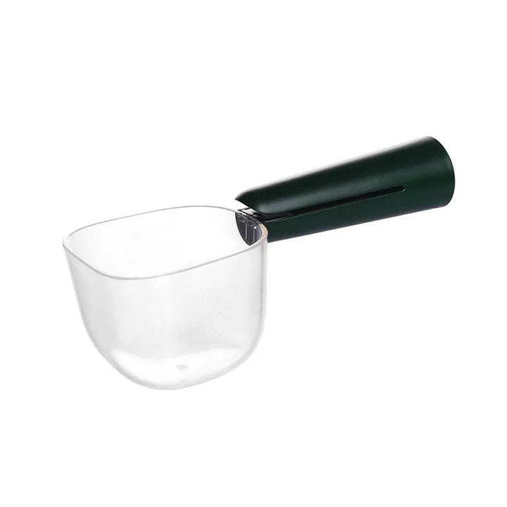 Hand holding white ergonomic measuring spoon, demonstrating comfortable grip for dry food scooping.