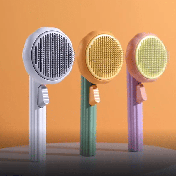 Close-up of the ergonomic pet brush, showing soft bristles for effective grooming and pet massage for dogs & cats.