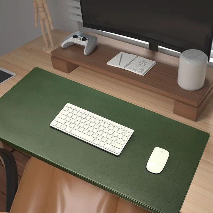 Productivity-boosting ergonomic PU leather desk mat & wrist support pad for office accessories.