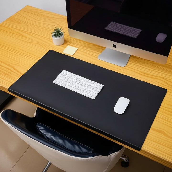 Comfortable ergonomic PU leather desk mat with wrist support for long hours at desk, anti-fatigue.