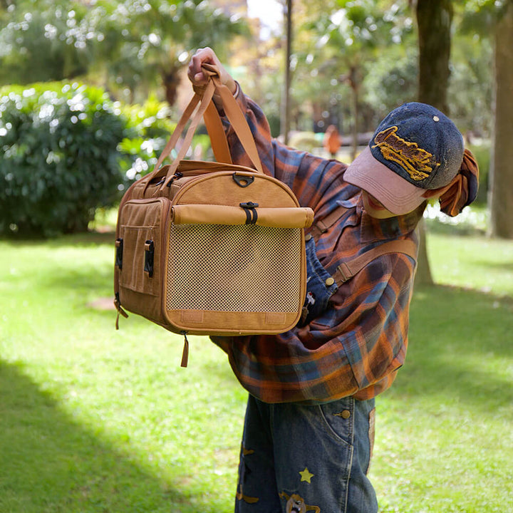 Dog carrier backpack style, unexpanded, showing padded shoulder straps and top handle