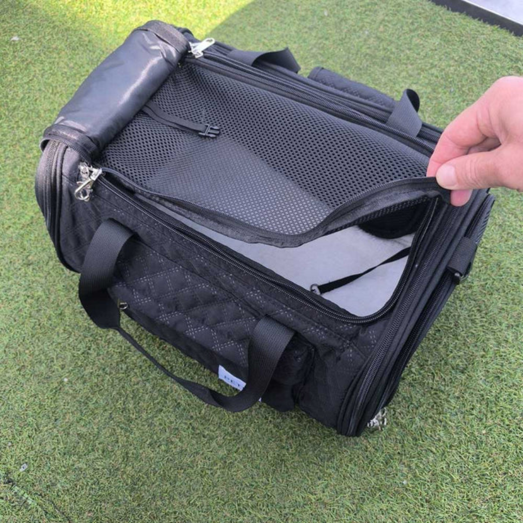 Black expandable in-cabin pet carrier with mesh windows for small dog travel comfort