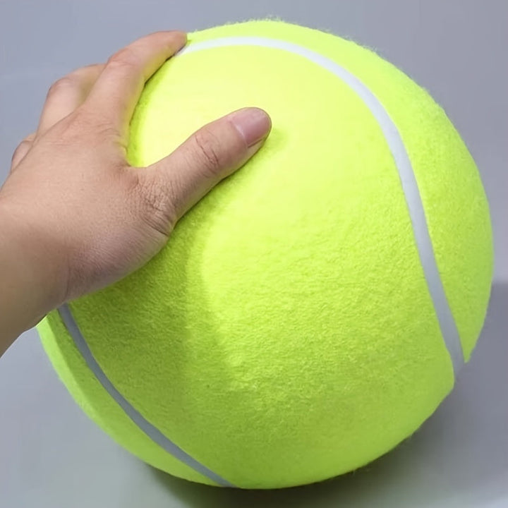 Oversized yellow tennis ball, a durable dog toy for large breed pets, enhancing outdoor fetch.