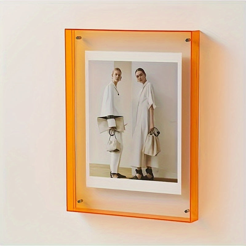 Modern acrylic art display frame, vibrant way to showcase photos & prints on wall or desk.