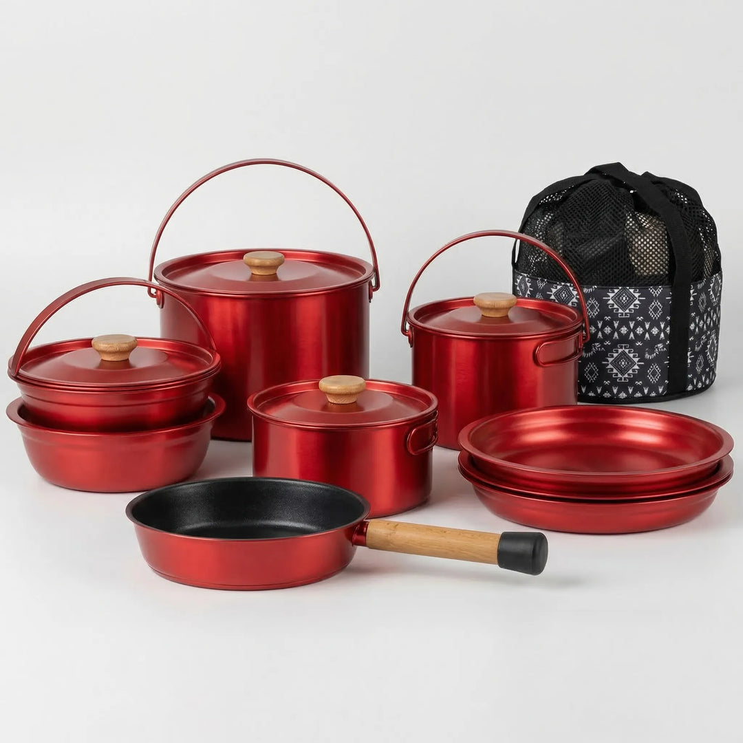 Unpacked family camping cookware set, showing all durable stainless steel components neatly arranged.
