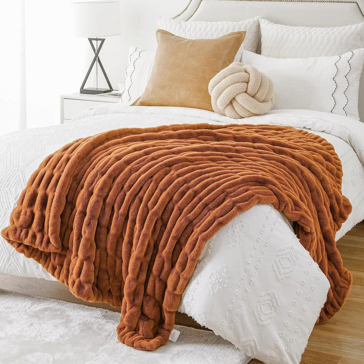 Luxurious faux fur throw, a perfect soft & cozy gift blanket for home comfort & decor.