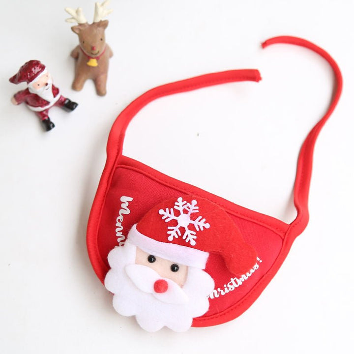 Dog apparel set for Christmas: festive hat and matching bib, great for holiday portraits.