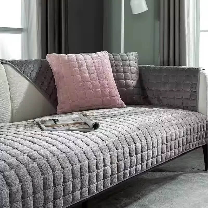 Sectional couch protected by a non-slip scratch-resistant flannel quilted cover, home decor