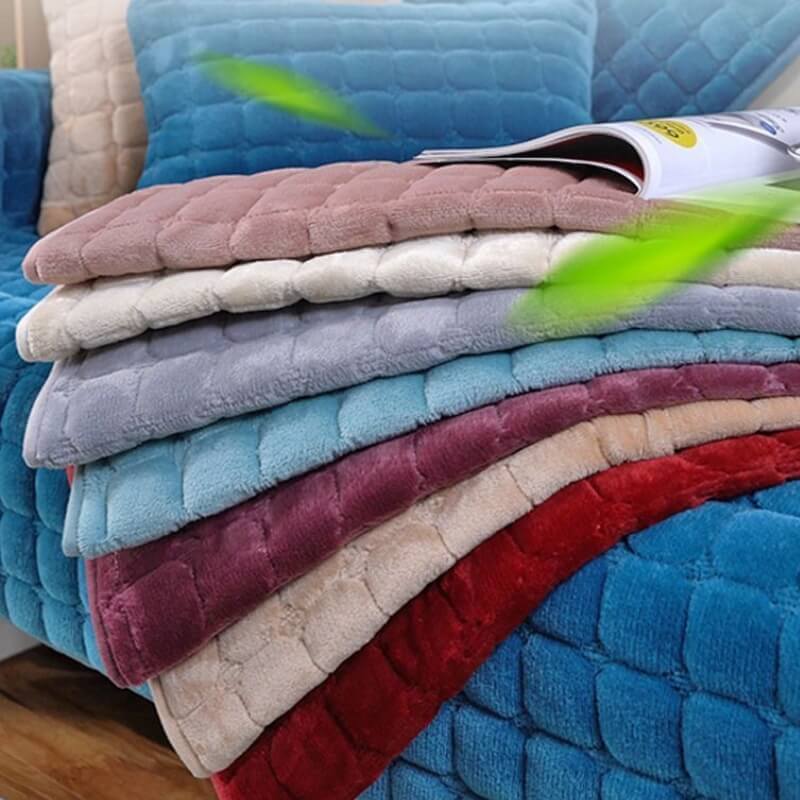 Non-slip flannel sofa protector with quilted pattern, perfect for pet-friendly furniture