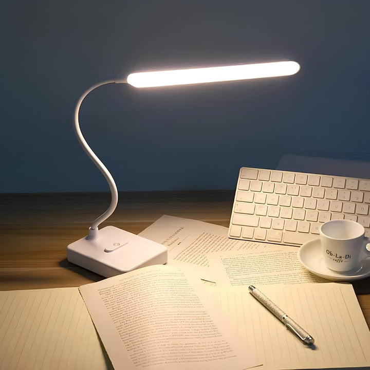 Sleek flexible LED desk lamp in white, with USB power option, perfect for any workspace or bedside reading.