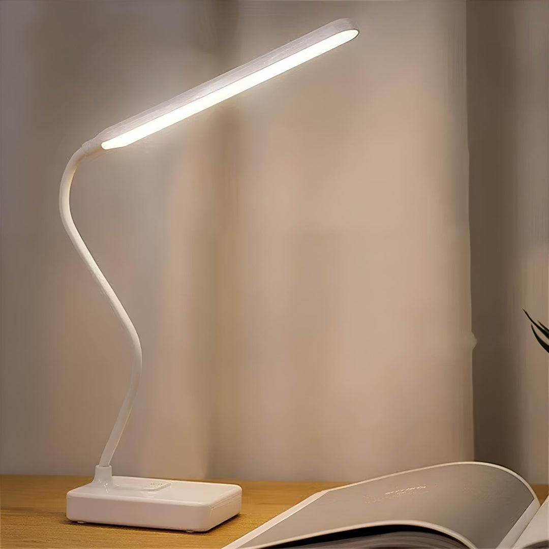 Versatile LED desk lamp with a flexible arm, ideal for home office setups, powered by USB or wall plug.