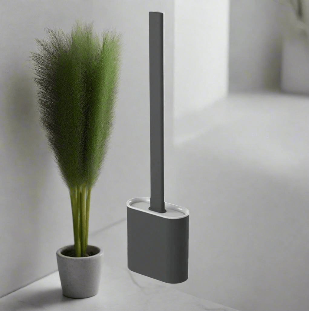 Flexible silicone toilet brush removes tough stains, ensuring sanitary deep cleaning for a fresh bathroom. Hygiene tool.