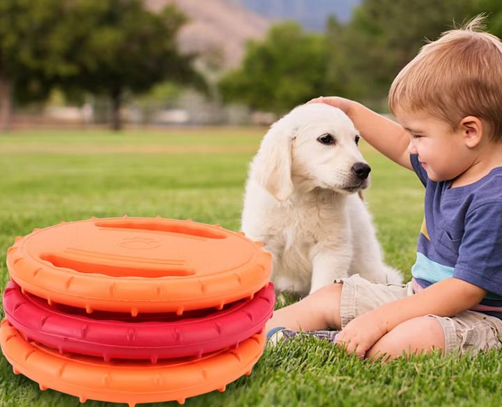 Red floating dog teething ring, textured chew toy for puppies and adult dogs, water play