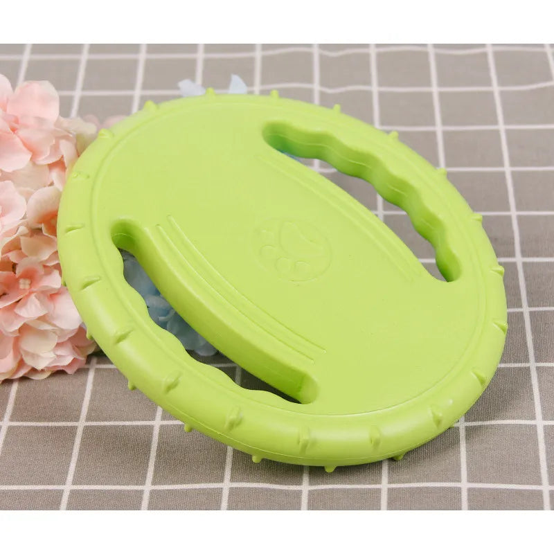 Happy dog playing with a red floating teething ring, ideal pet supplies chew toy