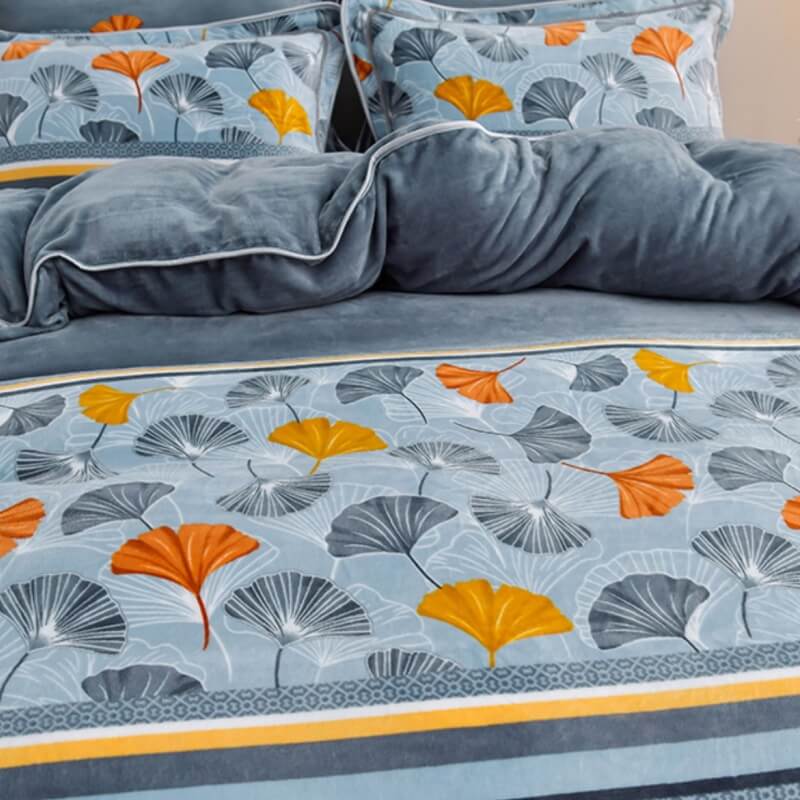 Luxury floral milk velvet bedding set (fitted sheet, flat sheet, pillowcases, bed skirt) for a cozy bedroom.
