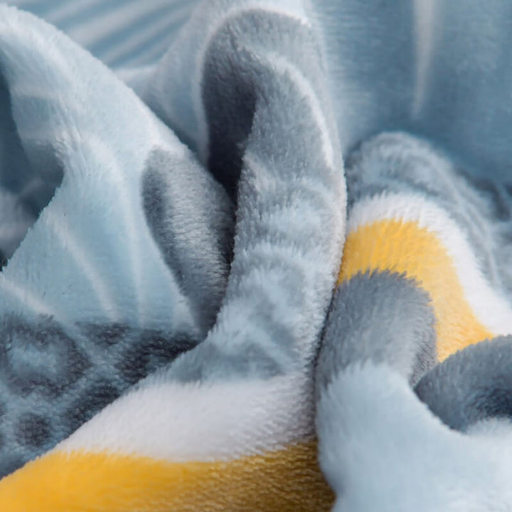 Close-up of elegant floral print on milk velvet bed sheet, showcasing softness and vibrant bedroom decor.