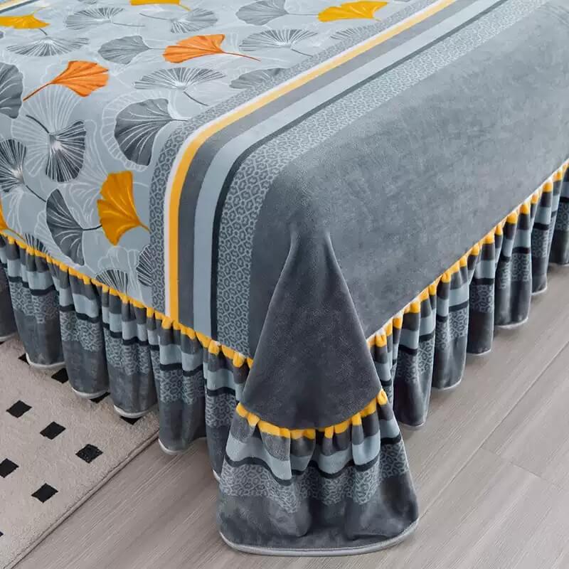 Queen size milk velvet floral bed sheet set, including a stylish bed skirt, enhancing bedroom aesthetics.