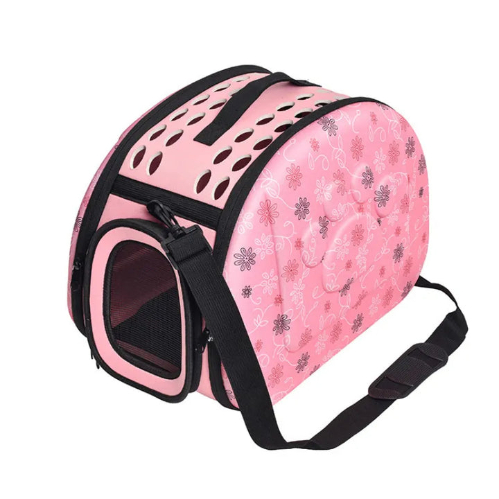 Portable pet travel carrier in a floral design, suitable for small dogs and car use