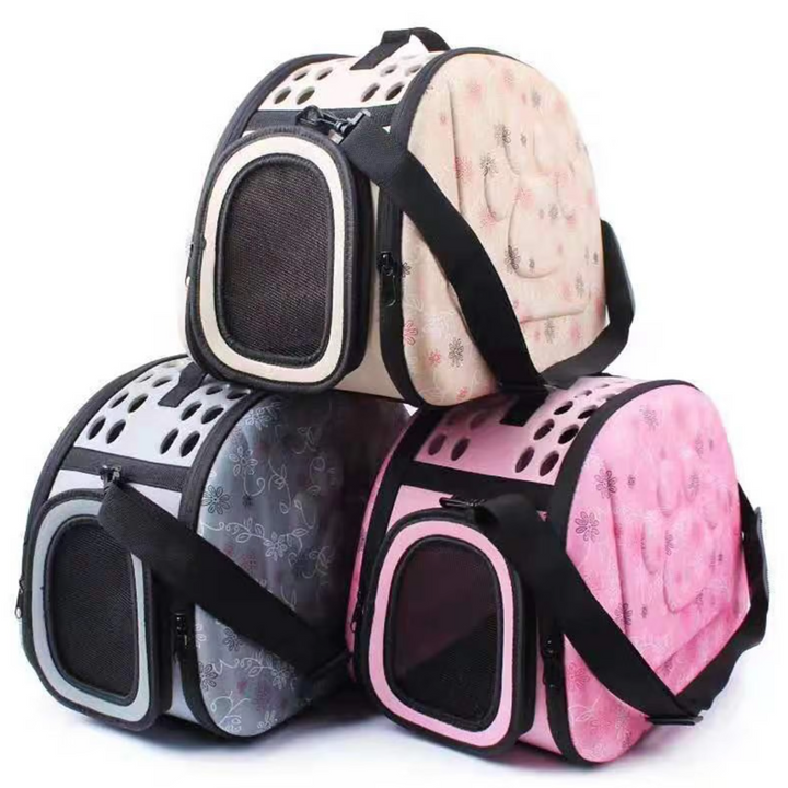 Travel-friendly floral pet carrier bag, a soft accessory for comfy dog car journeys