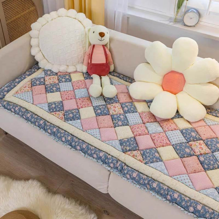 Floral pure cotton pet-friendly sofa cover in a vibrant print, protecting furniture from pets.