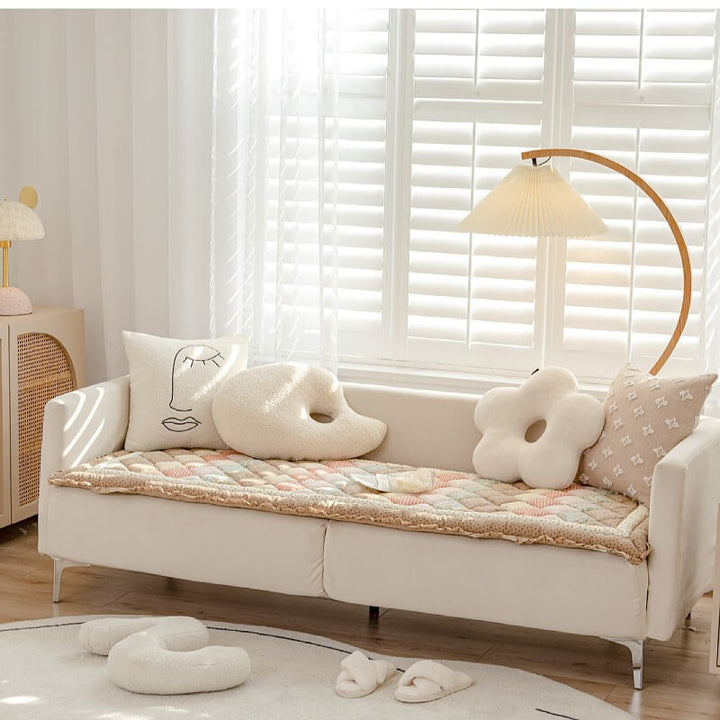 Detailed view of the floral pattern on a pure cotton pet-friendly sofa cover, soft texture.