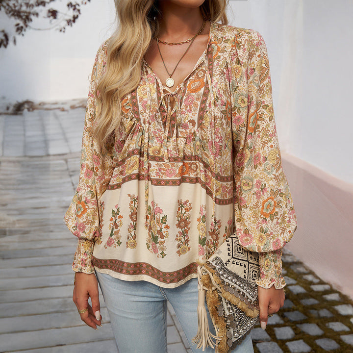 Boho floral V-neck blouse for women, a loose-fit top for casual chic style, perfect for spring/summer.