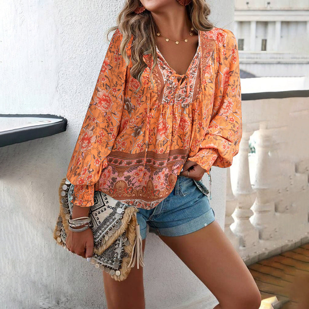 Effortless style women's boho floral blouse with puff sleeves, a loose-fit top for casual chic comfort.