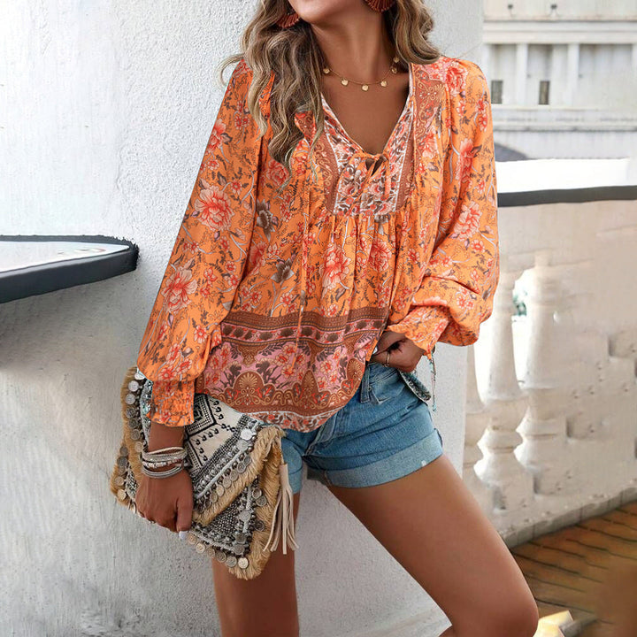 Effortless style women's boho floral blouse with puff sleeves, a loose-fit top for casual chic comfort.