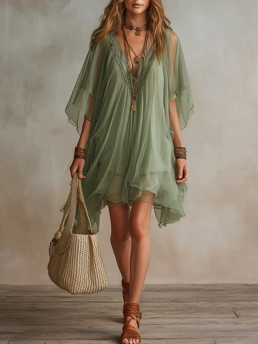 Flowy layered green mini dress for women with a relaxed fit, perfect for summer casual wear or beach trips.