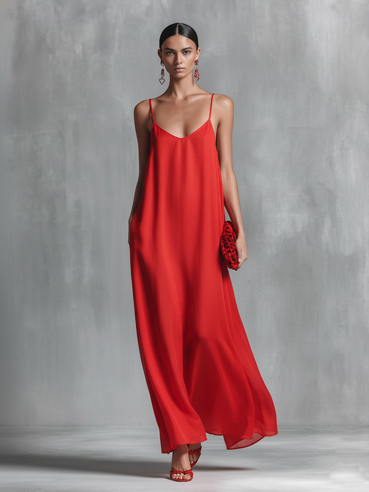 Elegant women's red flowy V-neck spaghetti strap maxi dress, ideal for summer evenings, resort, or special occasions.