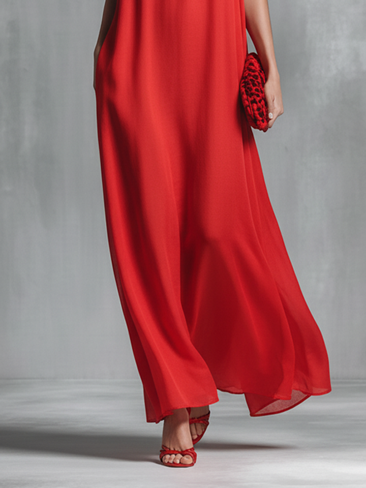 Luxurious red flowy V-neck spaghetti strap maxi dress, an elegant evening gown choice for women's summer events.