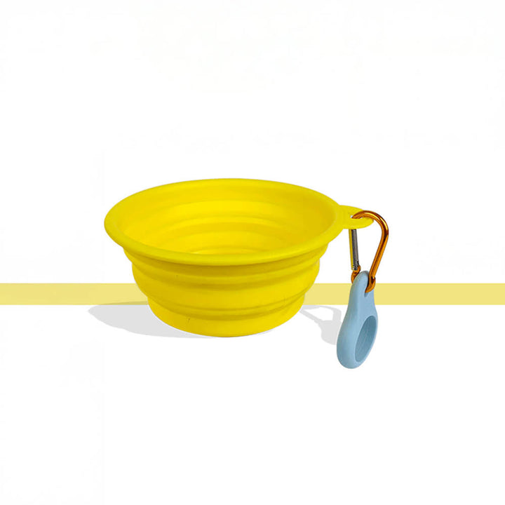 Unisex portable silicone pet bowl in green, collapsible design for easy travel with pets.