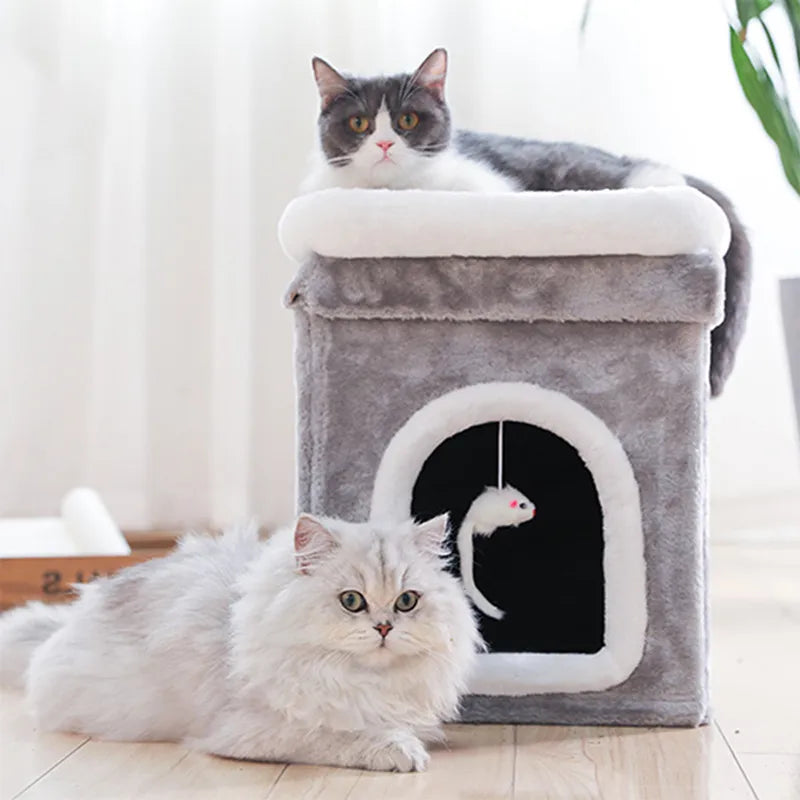 Foldable cat bed with soft plush interior, cozy cave, and attached cat toy, small size for feline comfort