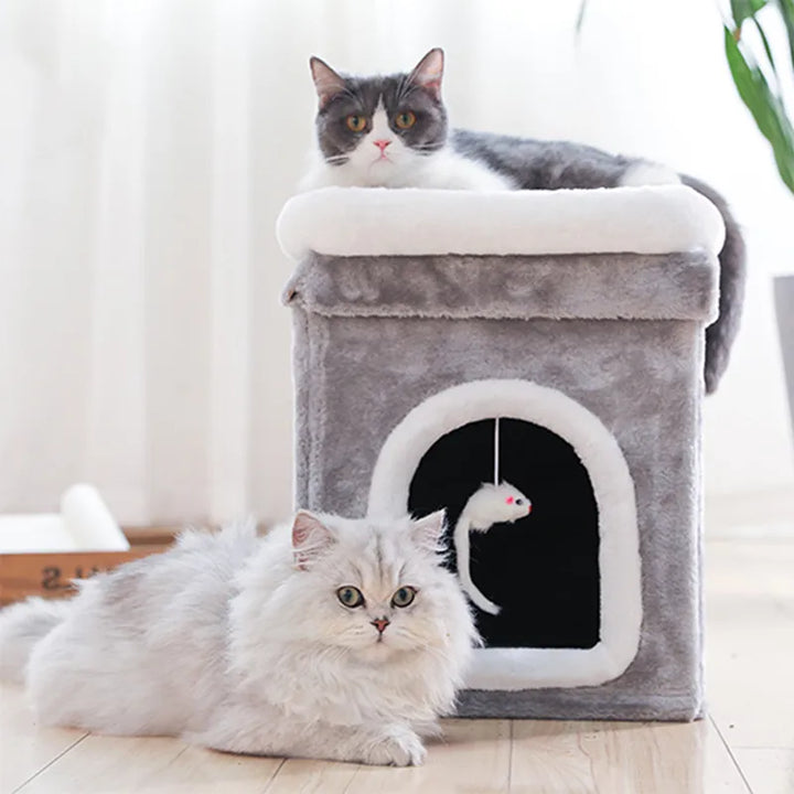 Foldable cat bed with soft plush interior, cozy cave, and attached cat toy, small size for feline comfort