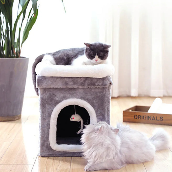 Compact pet furniture: S-sized foldable cat bed featuring a cuddly cave design and playful toy for cats