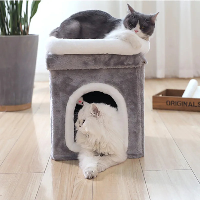 Plush cat bed with a foldable design, perfect for small spaces, includes an engaging toy for pet entertainment
