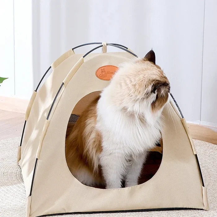 Portable cat house, collapsed flat for storage on a light background, durable pet supplies