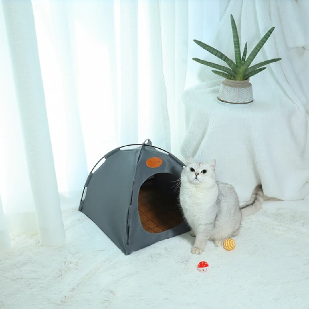 Close-up of mesh window on a dark gray foldable cat house, breathable outdoor pet tent feature